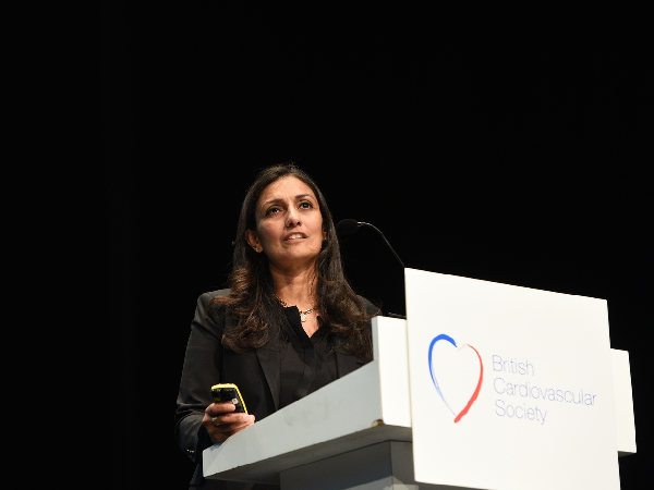 BHF's Clinical Director Dr Sonya Babu-Narayan speaking on stage at a British Heart Foundation and British Heart Foundation joint conference