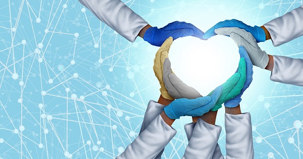 Hands of a team making a heart shape Hands of a team making a heart shape