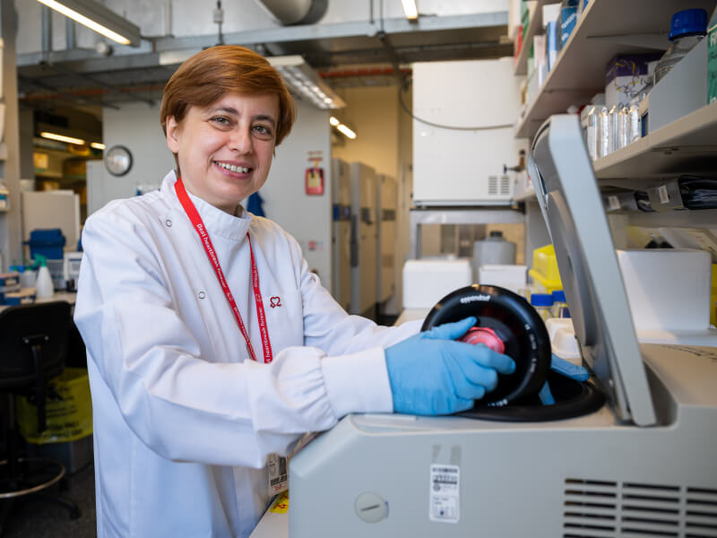 BHF researcher Anna Zampetaki is stood in a laboratory conducting research for BHF.