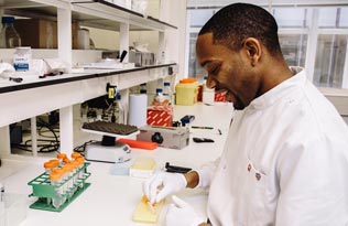 BHF researcher in a lab
