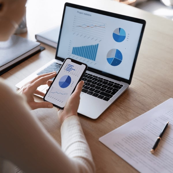 A person donates shares using their phone