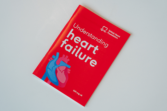 Red booklet with the title Understanding heart failure on a white background