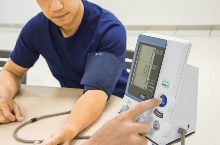 Man having his blood pressure checked