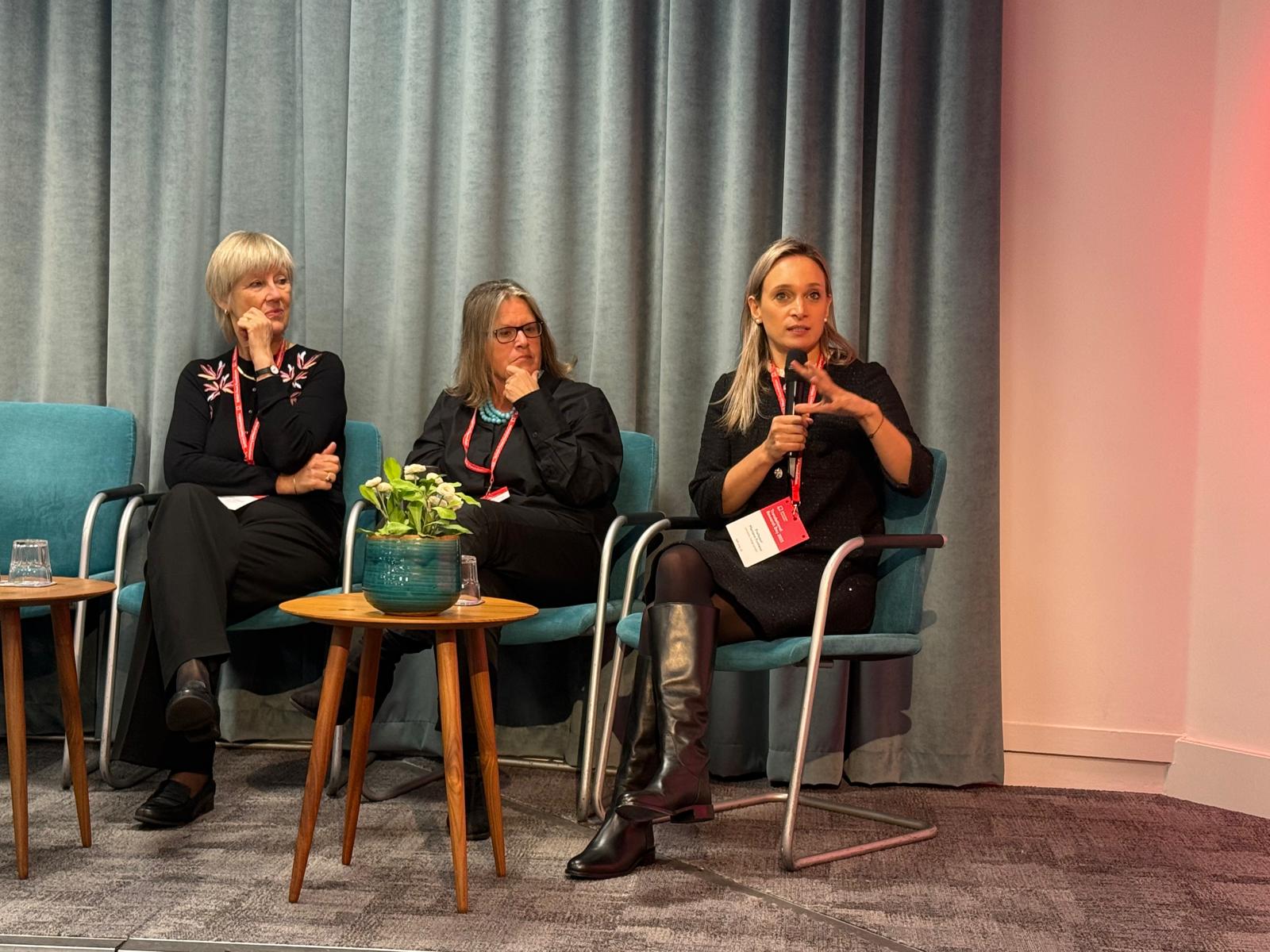 Audience Q&A session at a research event