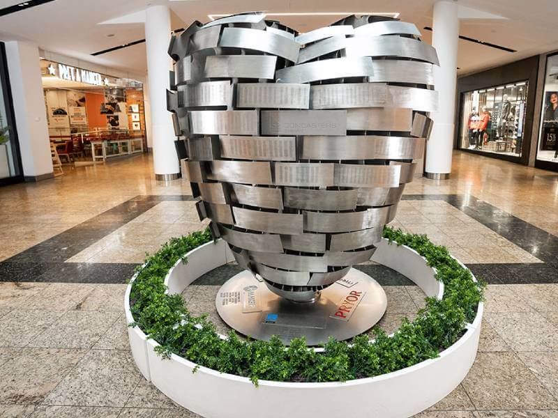 Heart of Steel with wreath border in situ in the shopping mall
