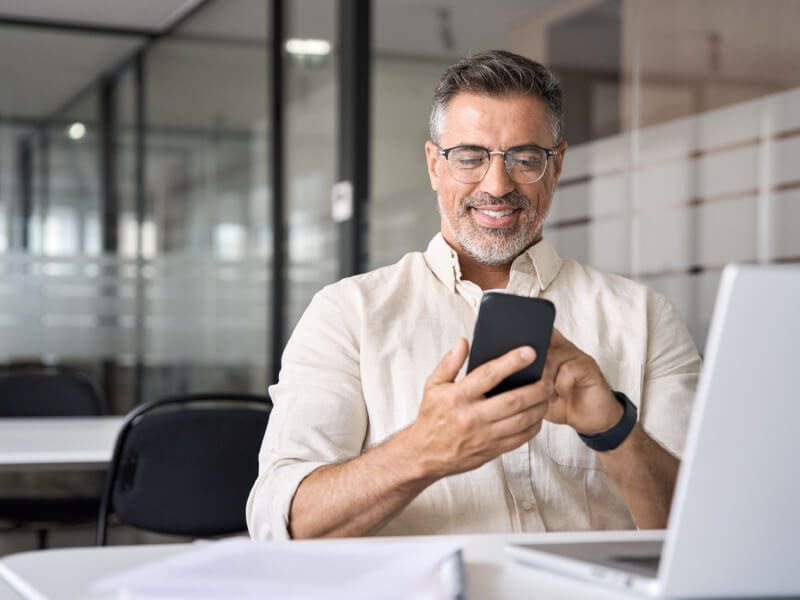 An employee in an office is signing up for Payroll Giving.
