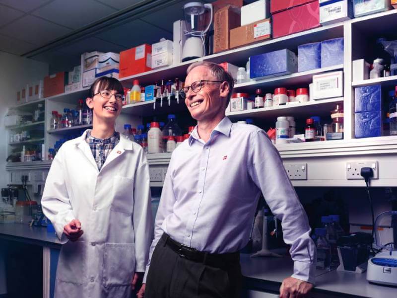 Cureheart researchers in a lab