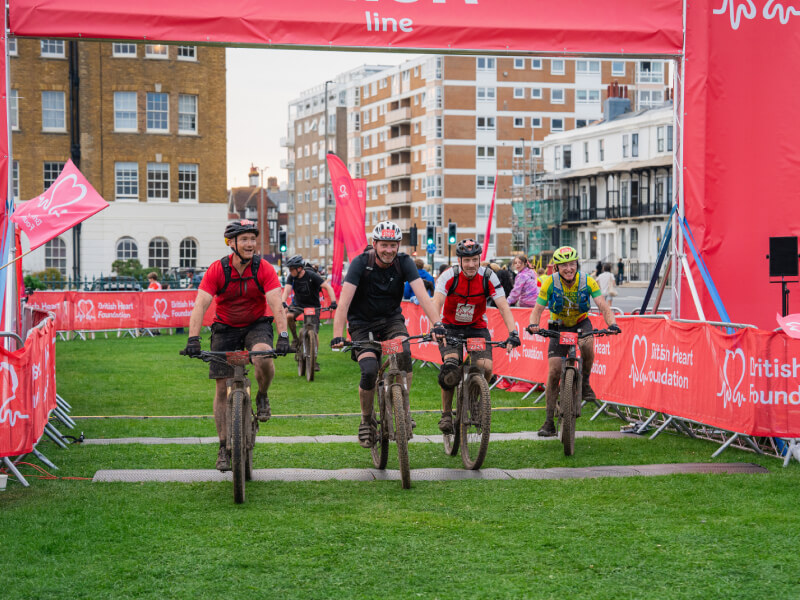 A group of riders reaching the finish line