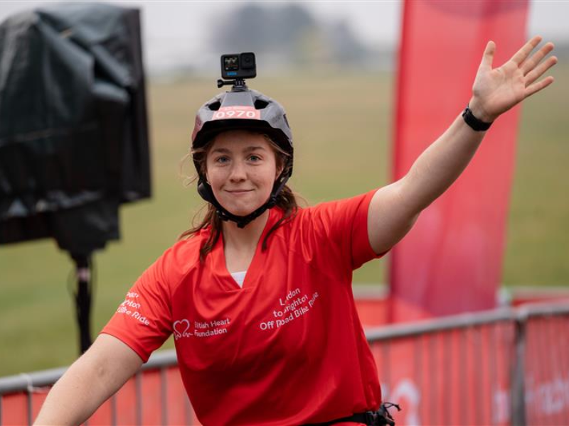 Lulu, a rider at the London to Brighton Off Road Bike Ride with her hand out