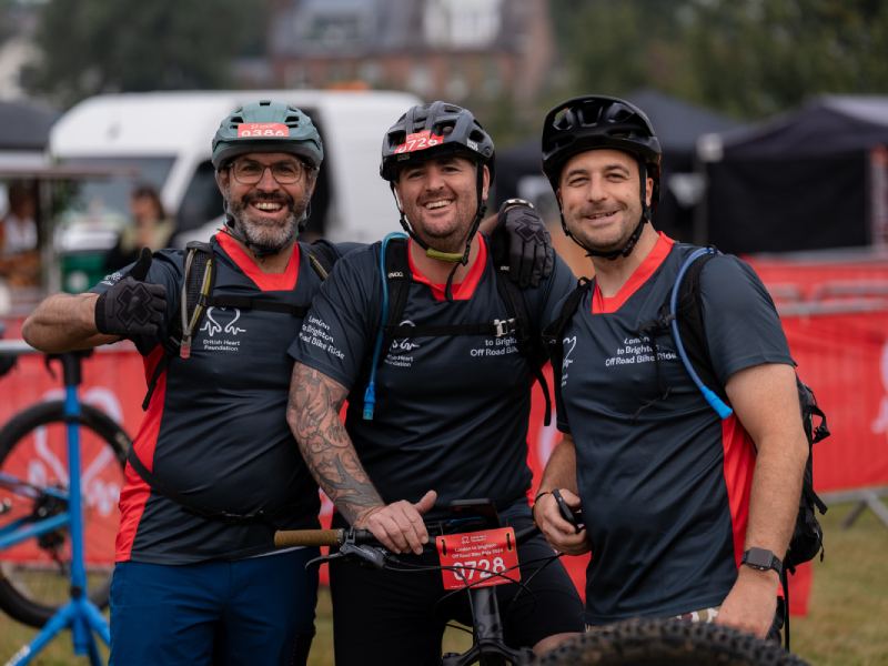 Three happy riders at the starting line of the London to Brighton Off Road Bike Ride