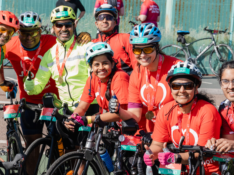 A group of riders getting ready for a bike ride