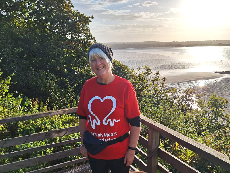 A photograph of Sue, by the beach.