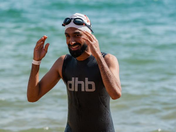 Person smiling after coming out of the sea