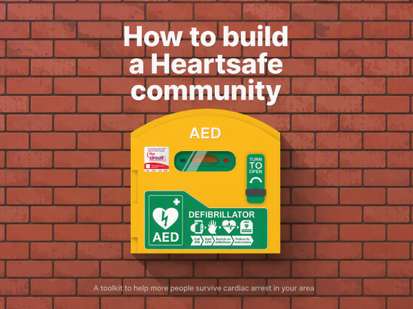 Illustration promoting a guide to building a Heartsafe community, featuring a public access defibrillator on a brick wall.