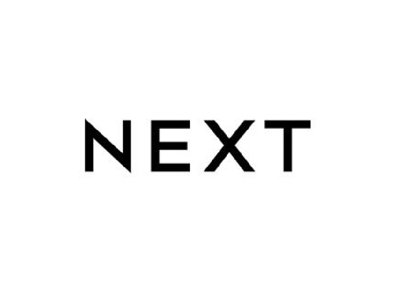 The Next logo. Black writing that says next in all capitals on a white background.