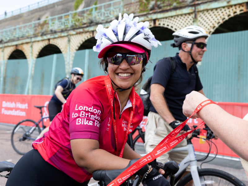 A London to Brighton bike rider smiling into the camera