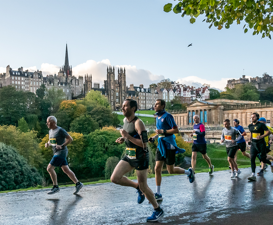 Group of runners running through Edinburgh