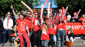 people cheering at an event