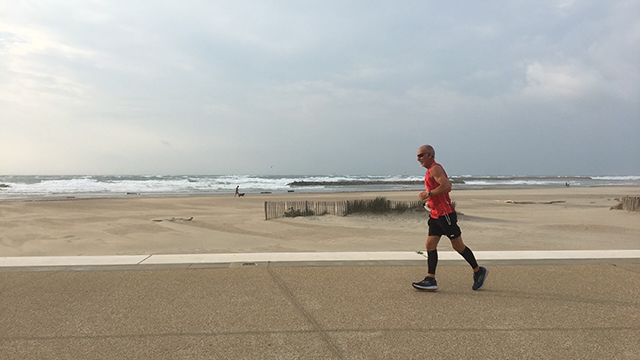 Virtual London marathon runner by the sea