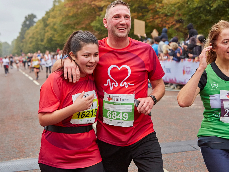 Couple at finish line at Royal Parks Half Marathon 2021