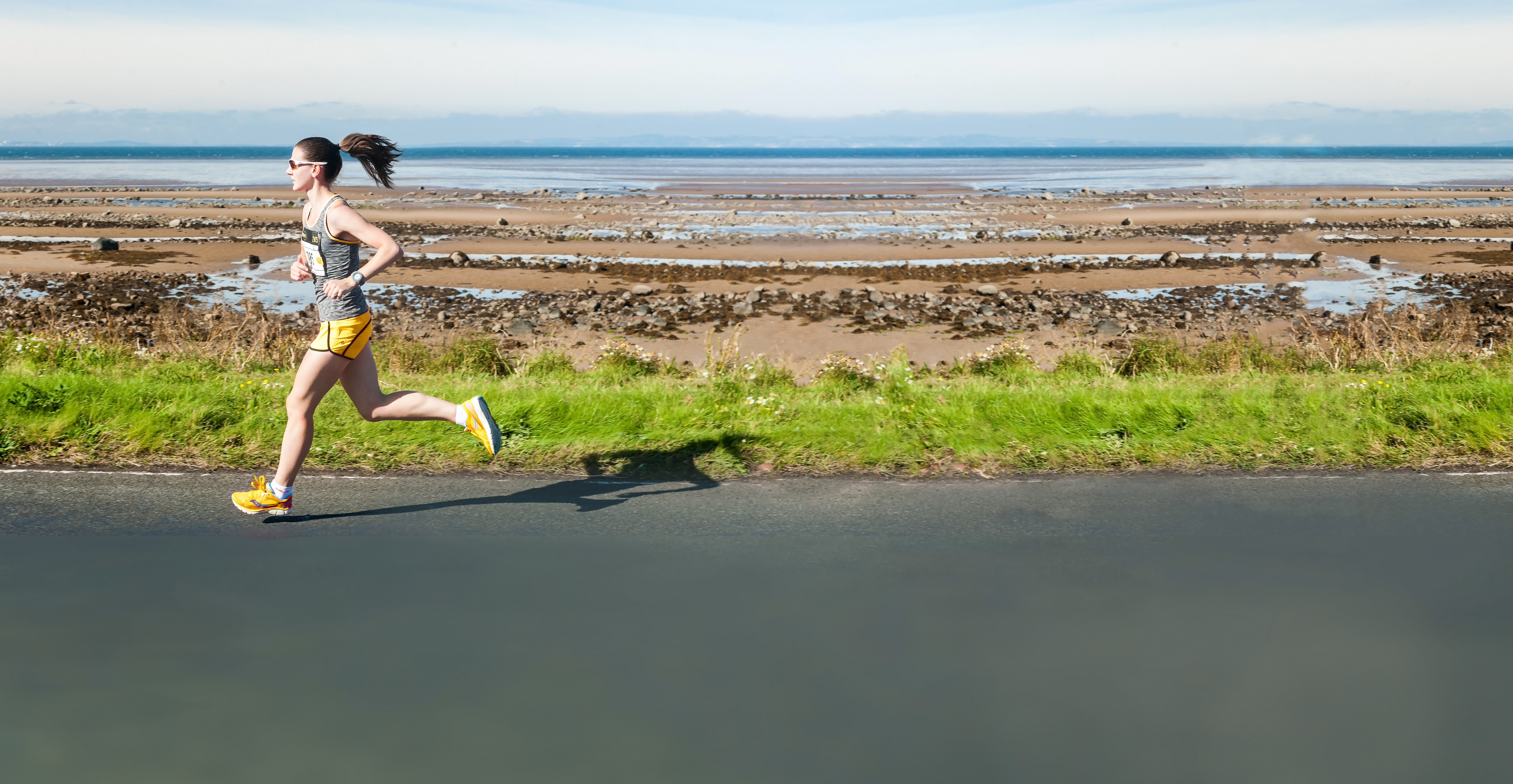 Runner along coast