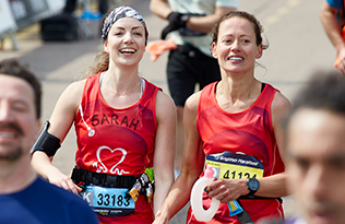Two smiling female BHF runners