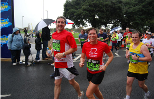 Two BHF runners at a rainy Great South Run.