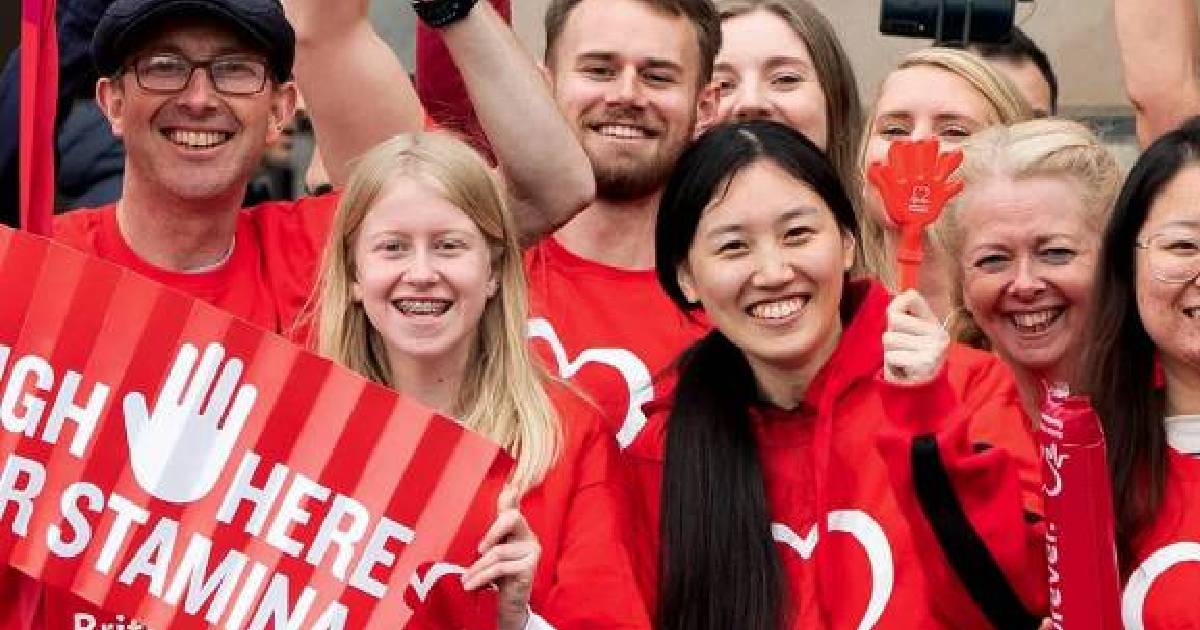 BHF Action Team volunteers celebrating at a cheer point.