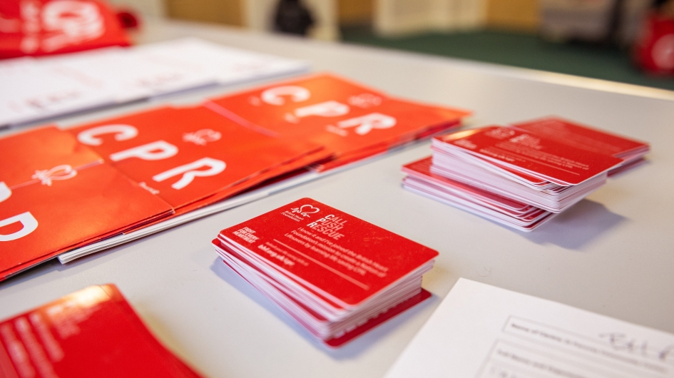 BHF CPR training resources laid out on a table