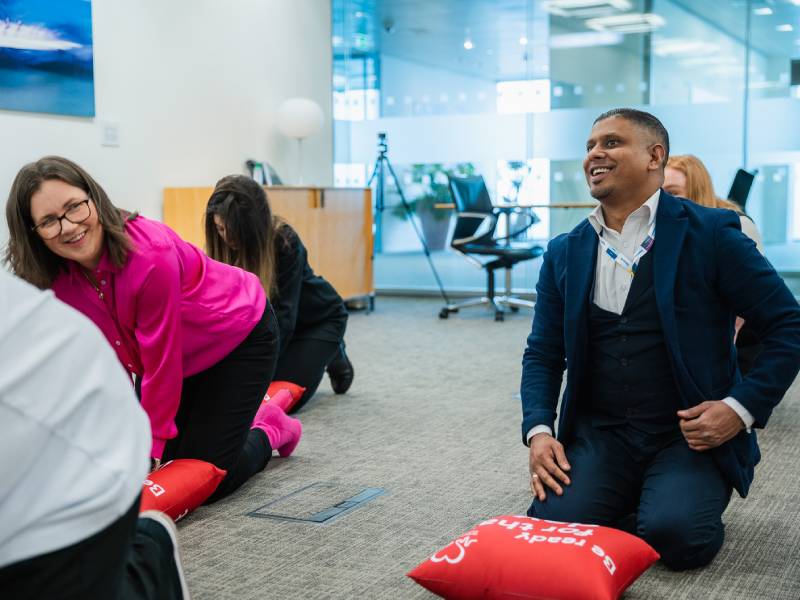 2 people doing Team RevivR at their workplace