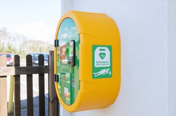 a defibrillator attached to an external wall