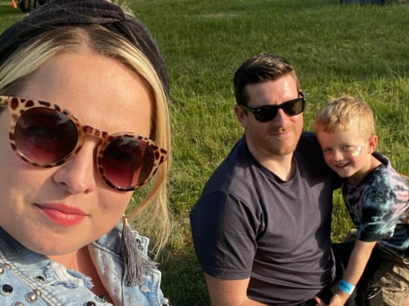 Kerrie and family outdoors.