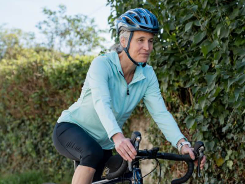 A woman riding a bike