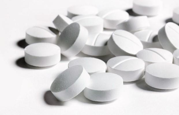 Several white aspirin tablets