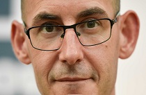 A close-up photo of Benedict Knox, Head of Communications at Healthwatch England