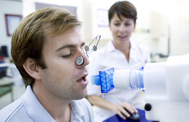 Man having a lung function test