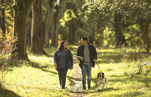 Cathy walking in the forest