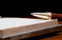 Pen resting on a notebook