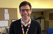 A headshot of Dr Ben Gibbison