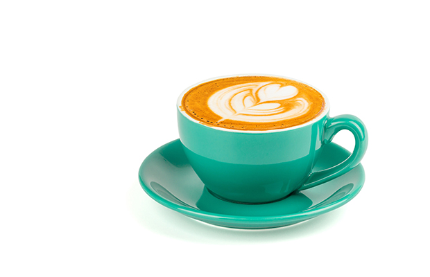 A cup of coffee with a saucer