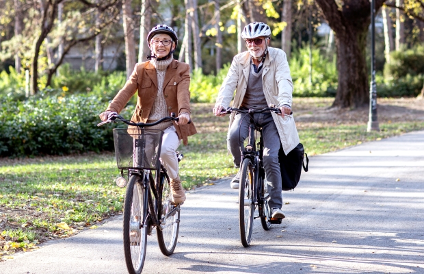 senior couple cycling
