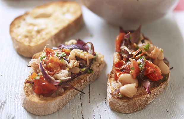 Beans and tomatoes on bruschetta