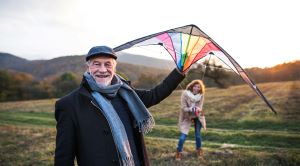 Couple flying kite