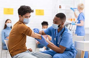 Man getting vaccine at hospital