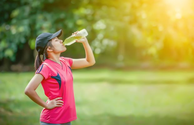 Woman drinking sports supplement