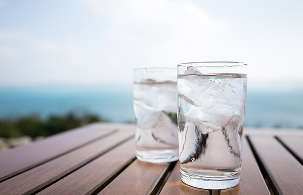 Glasses of water on table outside