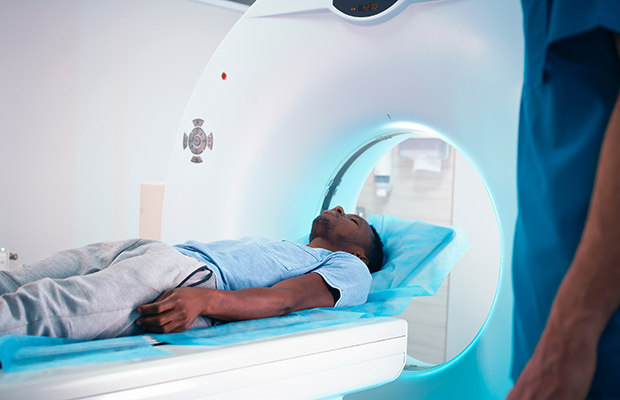 Male on CT scanner