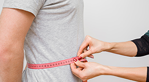 Waist being measured