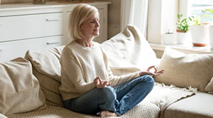 Senior woman meditating