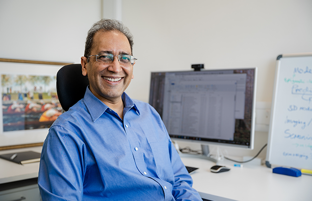 Sanjay Sinha at his desk